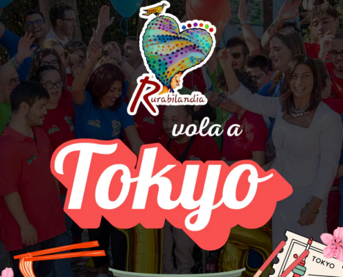 Grafica ufficiale del viaggio a Tokyo di Rurabilandia con le bandiere di Italia e Giappone, dettagli della partenza del 23 ottobre e foto della delegazione dei ragazzi.